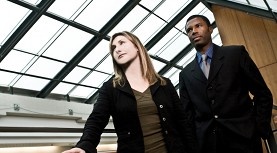 A professor and student standing in the Rowe Building A professor and student standing in the Rowe Building